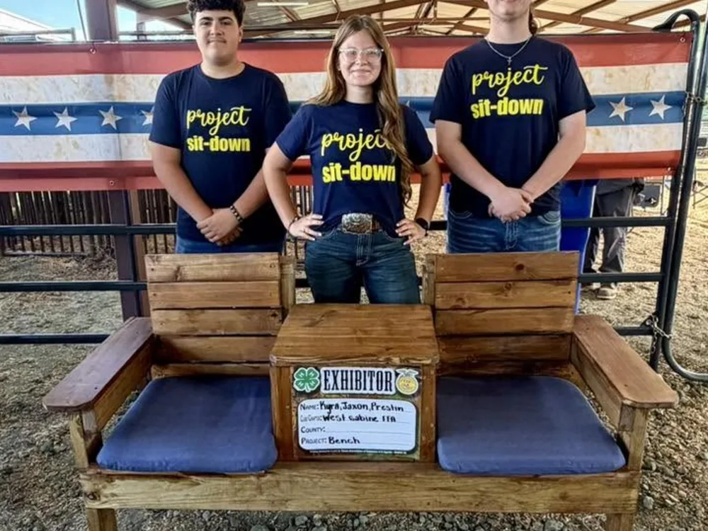 Kura, Jaxon, and Prestin of West Sabine FFA at the Show